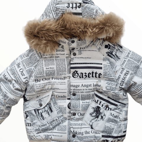 Galliano newspaper print puffer jacket with fur hood - My Runway Archive